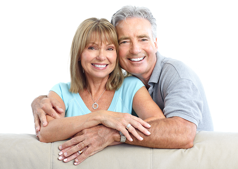 Senior Happy Couple With Dental Implants From Neighborhood Family Dentistry