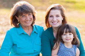 Three generations of females smiling